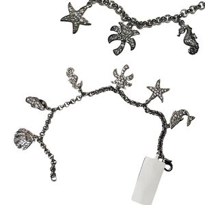 Silver Plated Ocean Treasures Coastal Themed Charm Bracelet Seahorse Palm Shells
